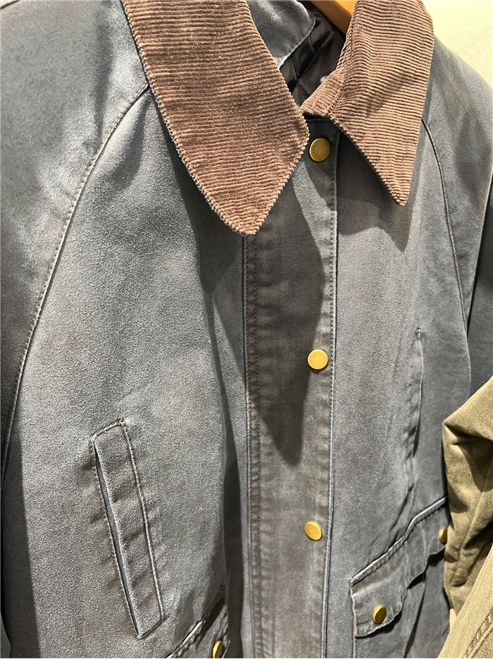 Parka encerada acolchada cuello pana