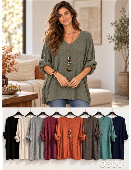 Jersey amplia con relieve geométrico y collar