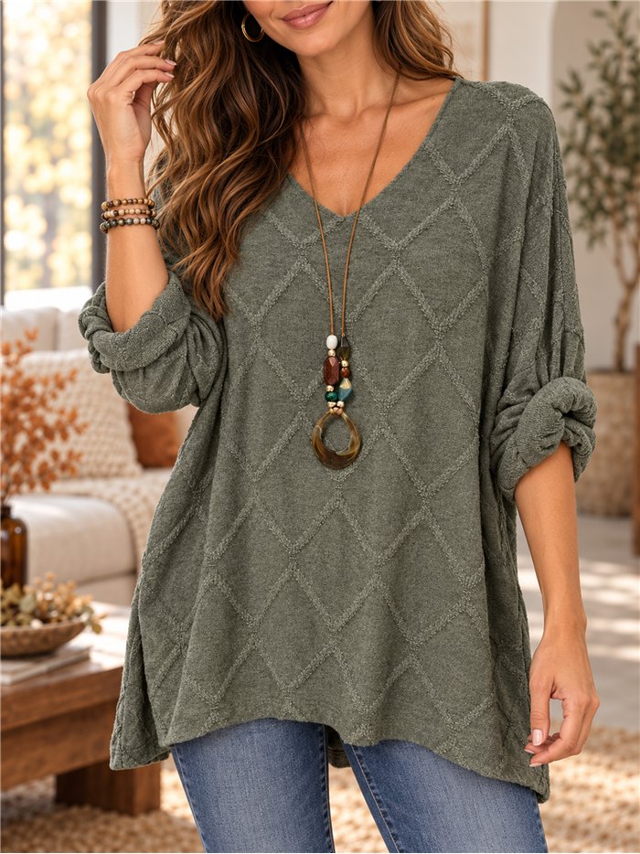 Jersey amplia con relieve geométrico y collar