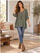 Jersey amplia con relieve geométrico y collar