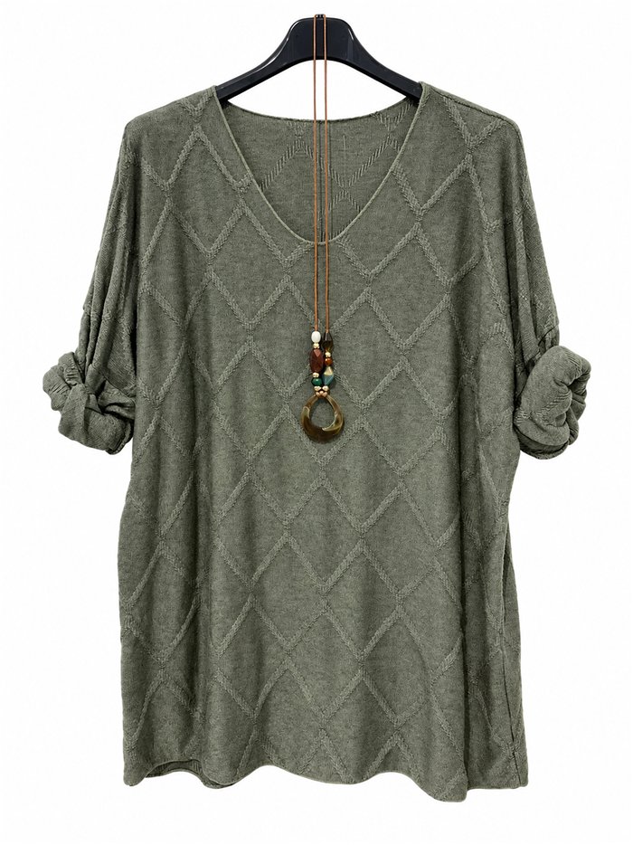 Jersey amplia con relieve geométrico y collar