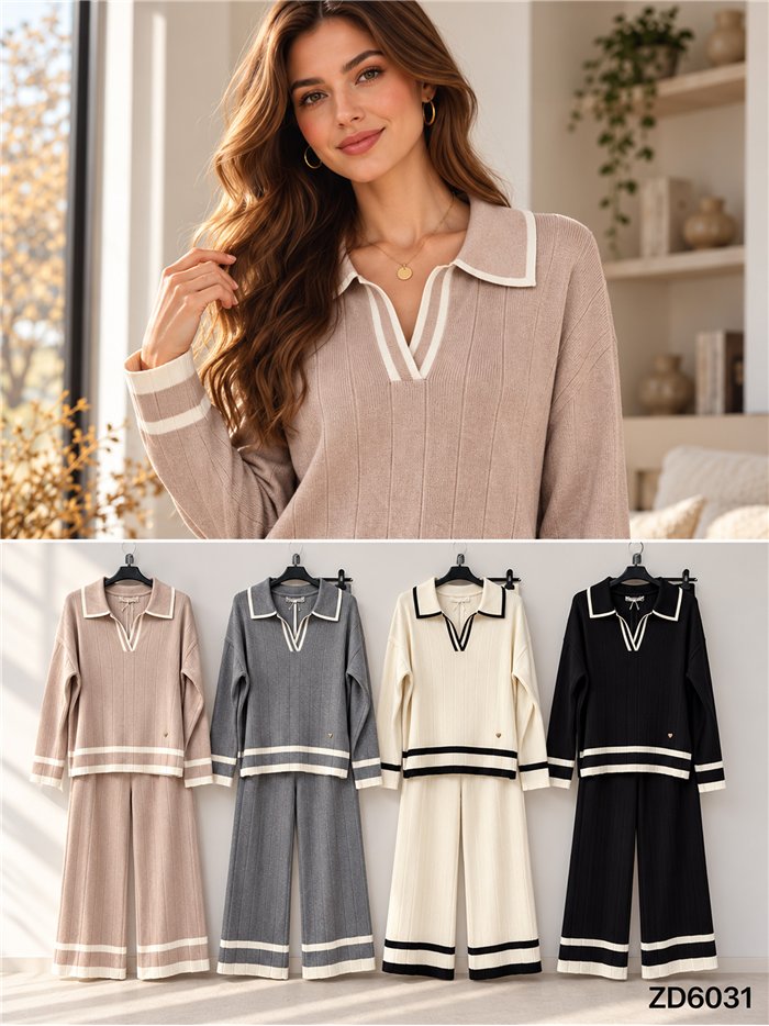 Completo composto da maglione a collo alto a coste e pantaloni a gamba larga.