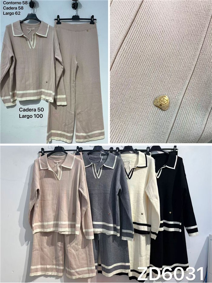 Completo composto da maglione a collo alto a coste e pantaloni a gamba larga.