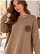 Jersey largo amplio con flor aplicada