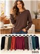 T-shirt con bottoni e polsini