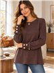T-shirt con bottoni e polsini