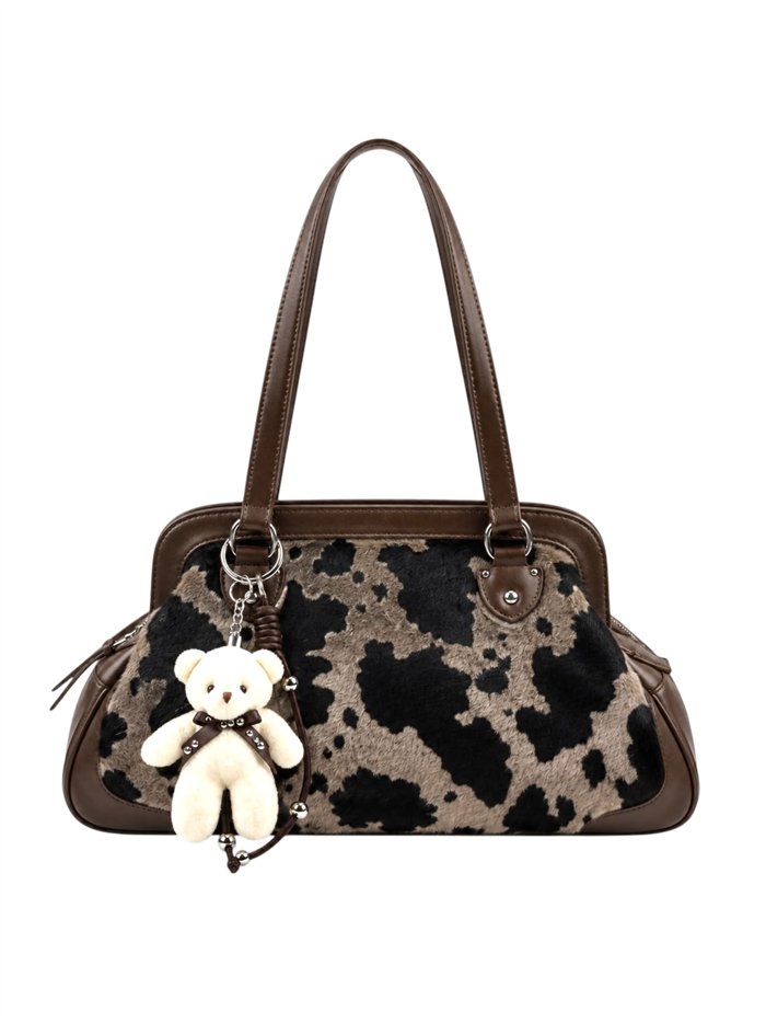 Bolsa de boliche com estampa animal e pingente.