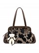 Bolsa de boliche com estampa animal e pingente.