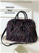 Bolso de mano de pelo bicolor