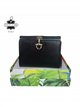 Cartera pequeña de piel con cierre metálico