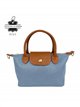 Bolso de mano bicolor de piel con mini solapa