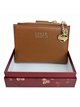 Compact wallet with zip coin pocket and charm