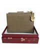 Compact wallet with zip coin pocket and charm