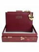 Compact wallet with zip coin pocket and charm