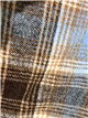 Checked belted cape with faux fur collar