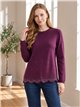 Strassbesetzter Jersey und gewellter Saum