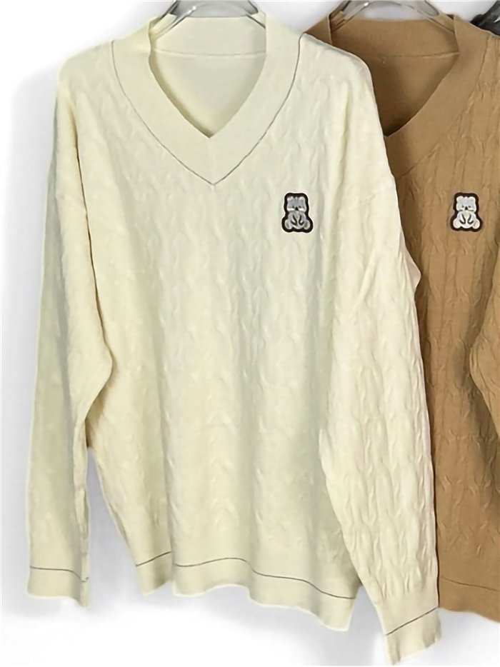 Pull en maille torsadée à patch ours en peluche