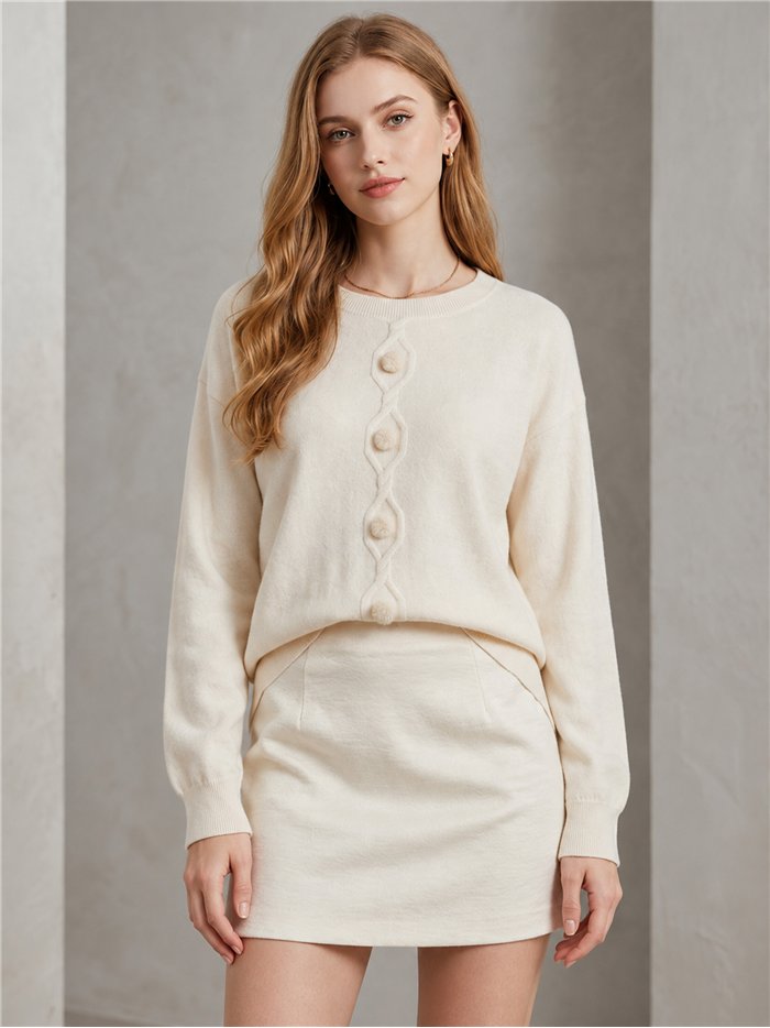 Jersey trenza central y pompones