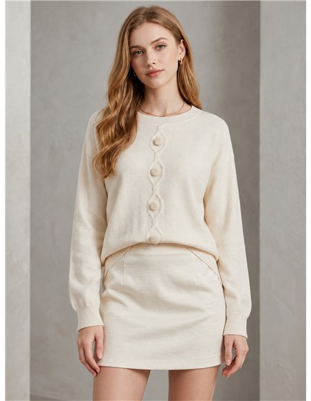 Jersey trenza central y pompones