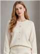Jersey trenza central y pompones