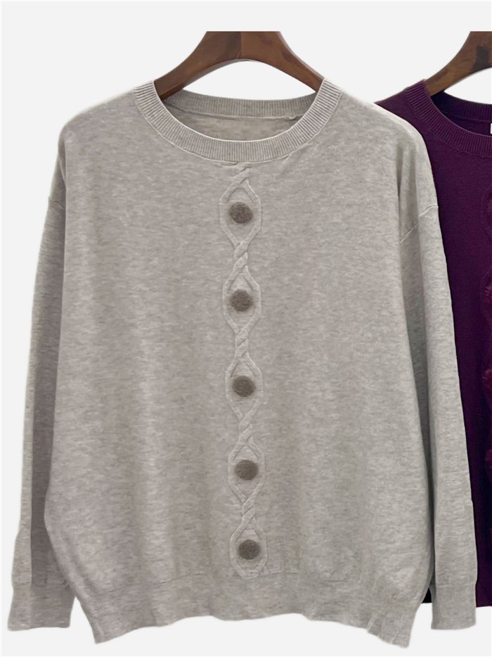 Jersey trenza central y pompones