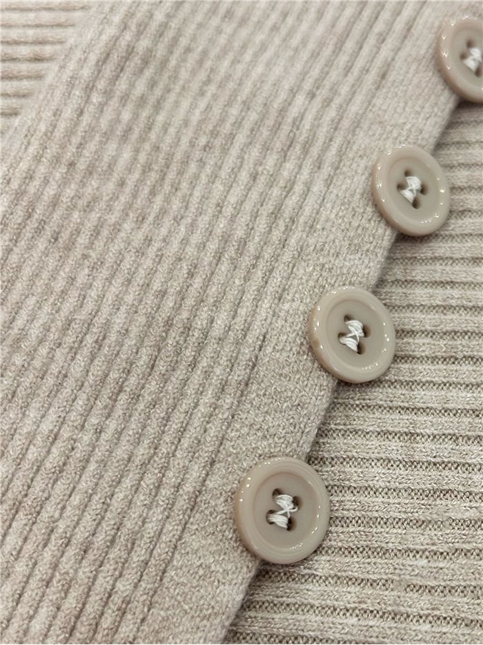 Jersey de canalé cuello alto y manga botones