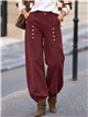 Pantalón jogger con botones dorados