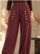 Pantalón jogger con botones dorados