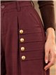Pantalón jogger con botones dorados